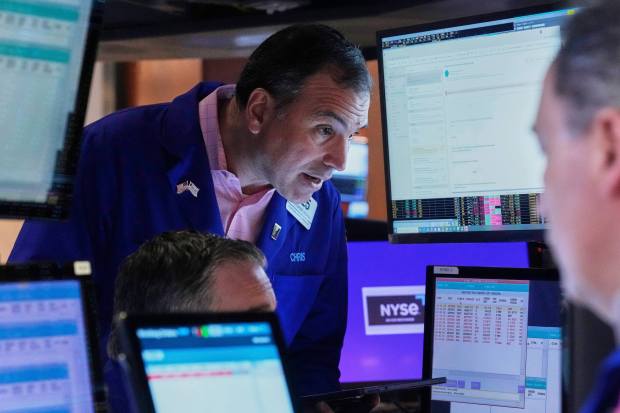 Wall Street’s rally roars into a 3rd day as companies’ profits keep piling up, for now at least